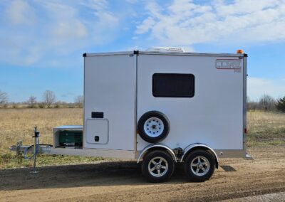 A high-quality trailer with a sleek, modern design and durable composite construction.